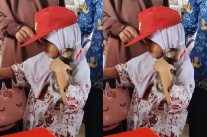Viral siswi SD keluarkan kucing dari tas saat jam makan siang di momen MPLS 2025.