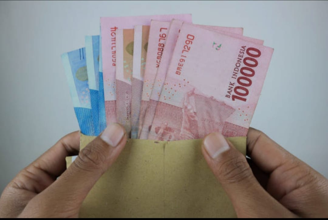 ILSTRASI. Pencairan dana BLT Kesra