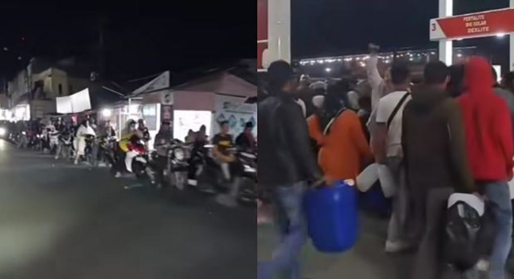 Warga Aceh Tengah mengantre di SPBU sambil membawa jeriken untuk membeli BBM. 