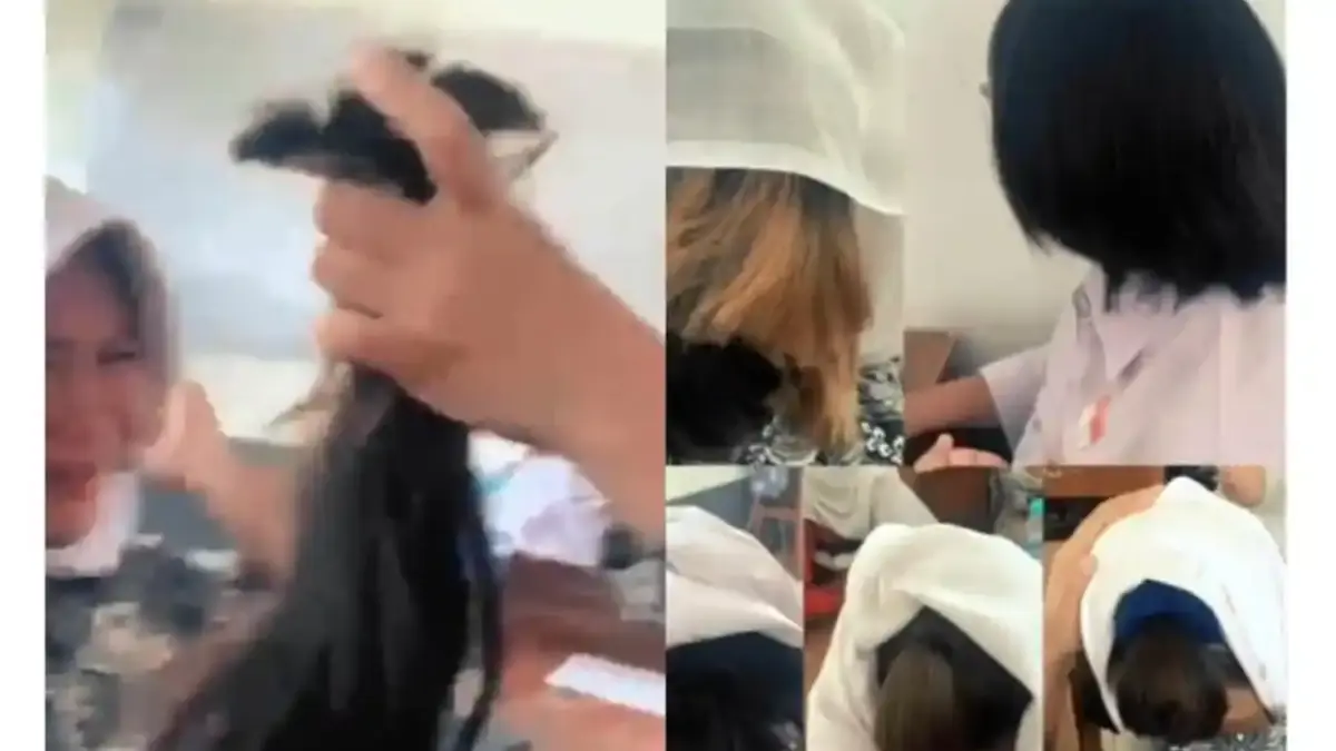 POTONG PAKSA - Sejumlah siswi di SMKN 2 Garut rambutnya dipotong karena kedapatan rambutnya berwarna.