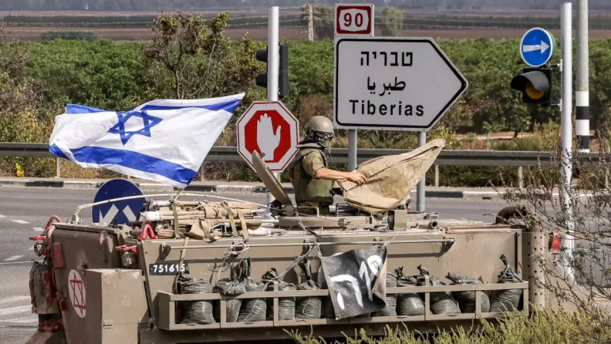 An Israeli medical vehicle moves along a road near the northern town of Kiryat Shmona close to the border with Lebanon on October 31, 2023 amid increasing cross-border tensions between Hezbollah and Israel [Jalaa Marey/AFP]