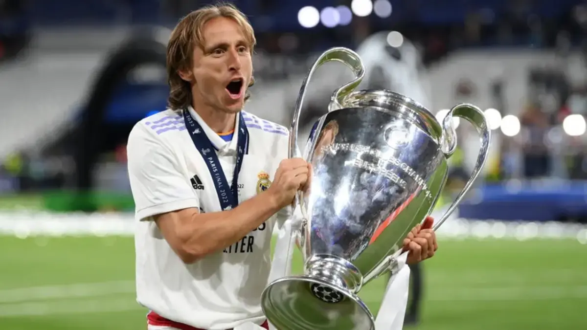 Ulasan mendalam seputar rumor transfer setelah muncul rilis berkala mengenai respons Luka Modric terkait reuni dengan Jose Mourinho di Real Madrid guna mempermudah perencanaan tontonan olahraga harian konsumen pekan ini. (Getty Images)