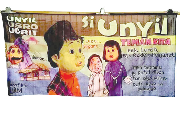 BERNILAI SENI TINGGI: Sebuah poster film Si Unyil yang dibuat tahun 1980-an yang dilukis menggunakan cat di atas kain.