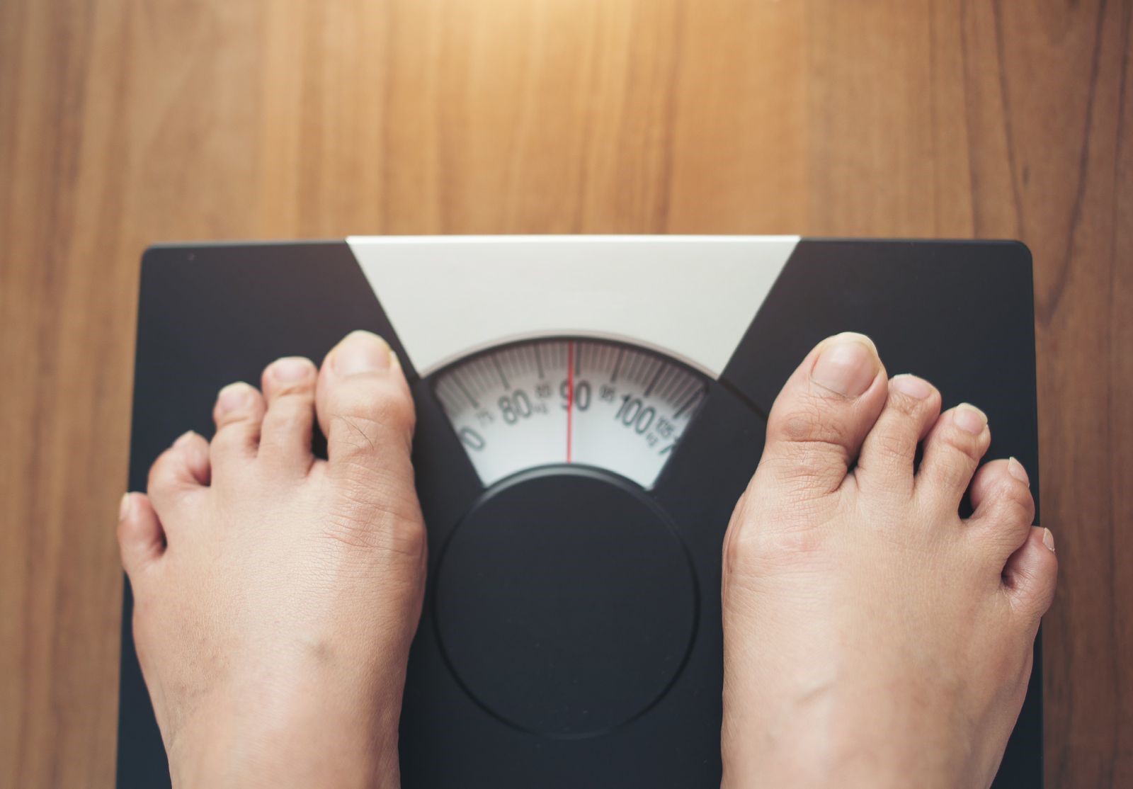 Timbangan badan obesitas.