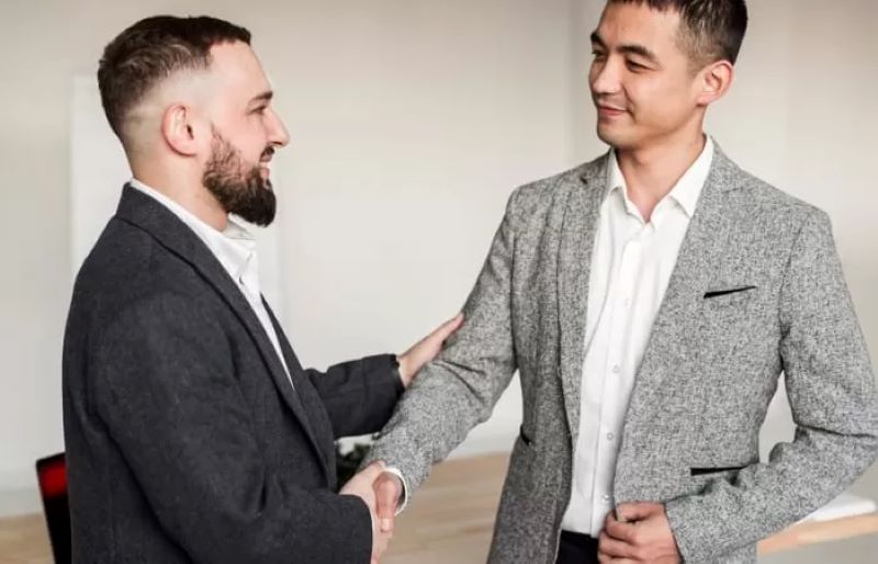 Ilustrasi berjabat tangan.