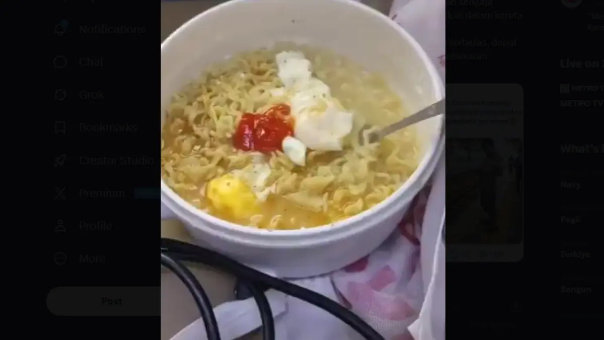 TANGKAPAN VIDEO: Seorang penumpang kereta mengunggah video saat dia masak di dalam gerbong kereta api memakai panci listrik dengan mengambil daya dari colokan yang ada di gerbong.