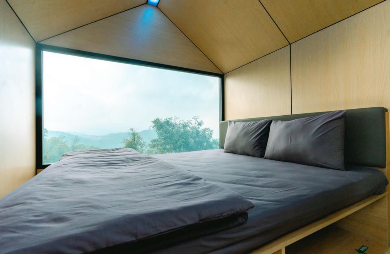Pemandangan dari dalam kamar Bobocabin Coban Rondo, Malang, Jawa Timur.
