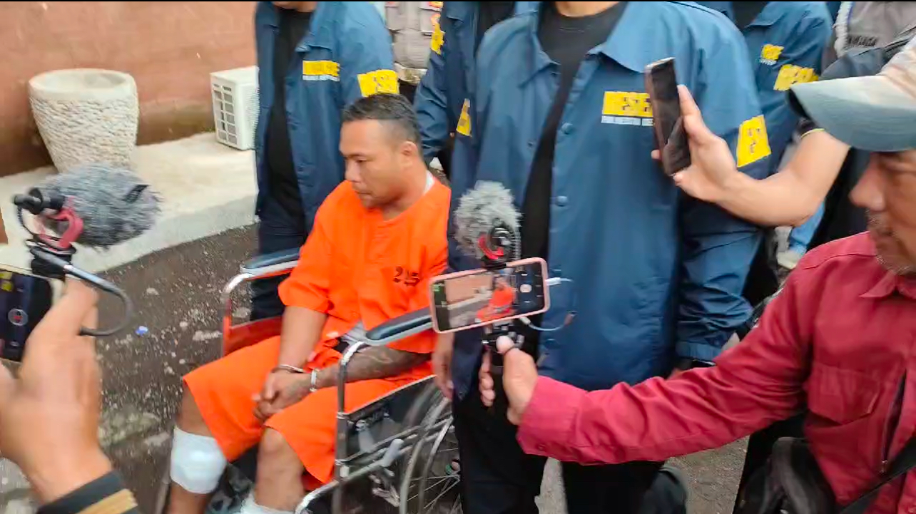 Bastomi Prasetiawan, tersangka penusukan Kadek Parwata saat ditangkap polisi.