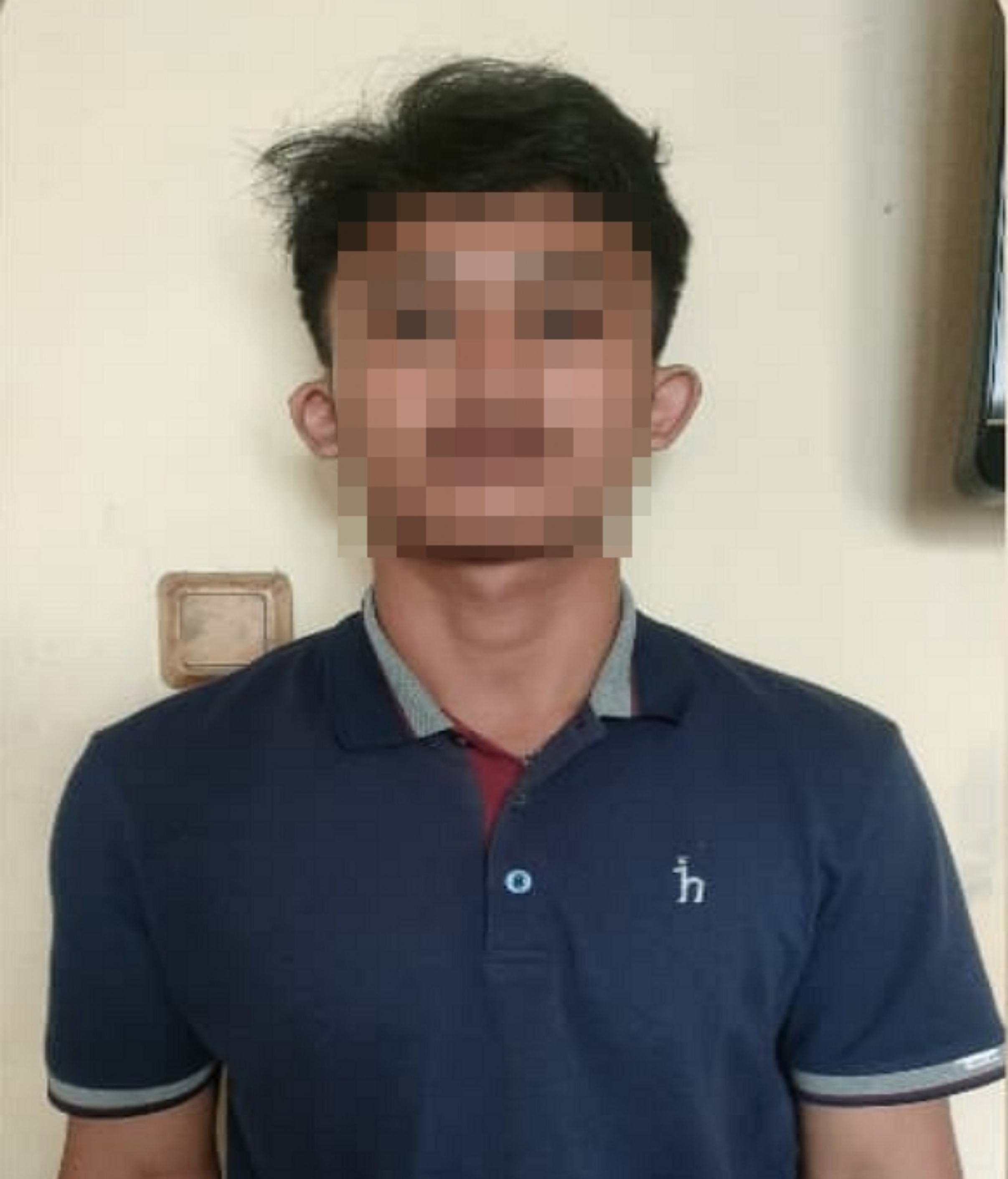 DITANGKAP: Sosok pelaku RS usai ditangkap polisi.