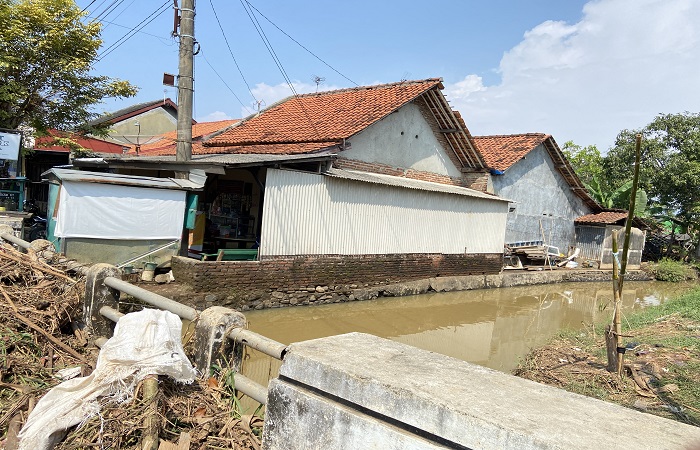 LANGGANAN BANJIR : Pemkab Batang berencana membangun embung di wilayah Kalipucang Wetan sebagai upaya mengurangi risiko banjir berkelanjutan yang rutin melanda Jalan Perintis Kemerdekaan Batang.