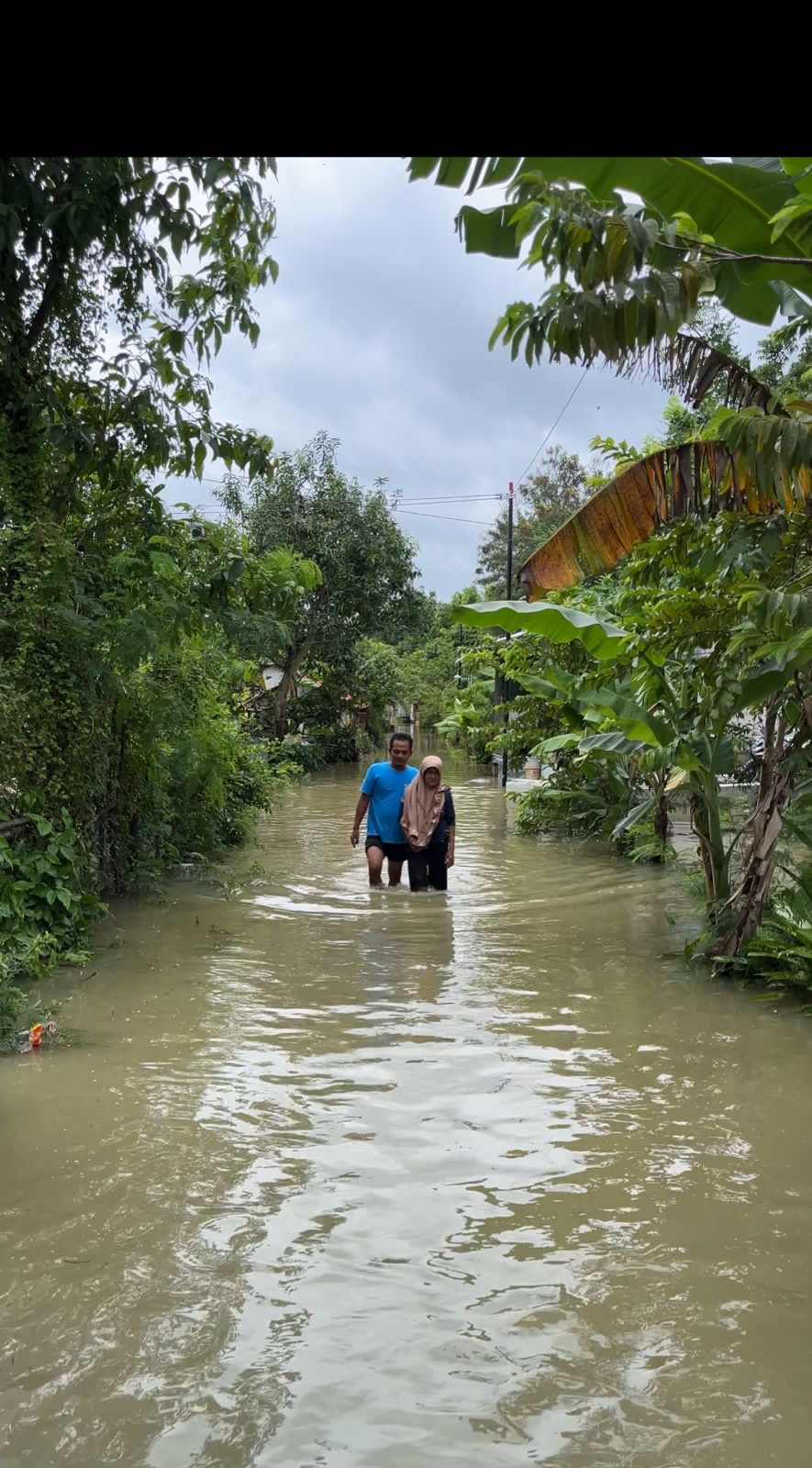 BANJIR: Kondisi banjir di Desa Pait, Kecamatan Siwalan, Kabupaten Pekalongan, Minggu (18/1/2026).