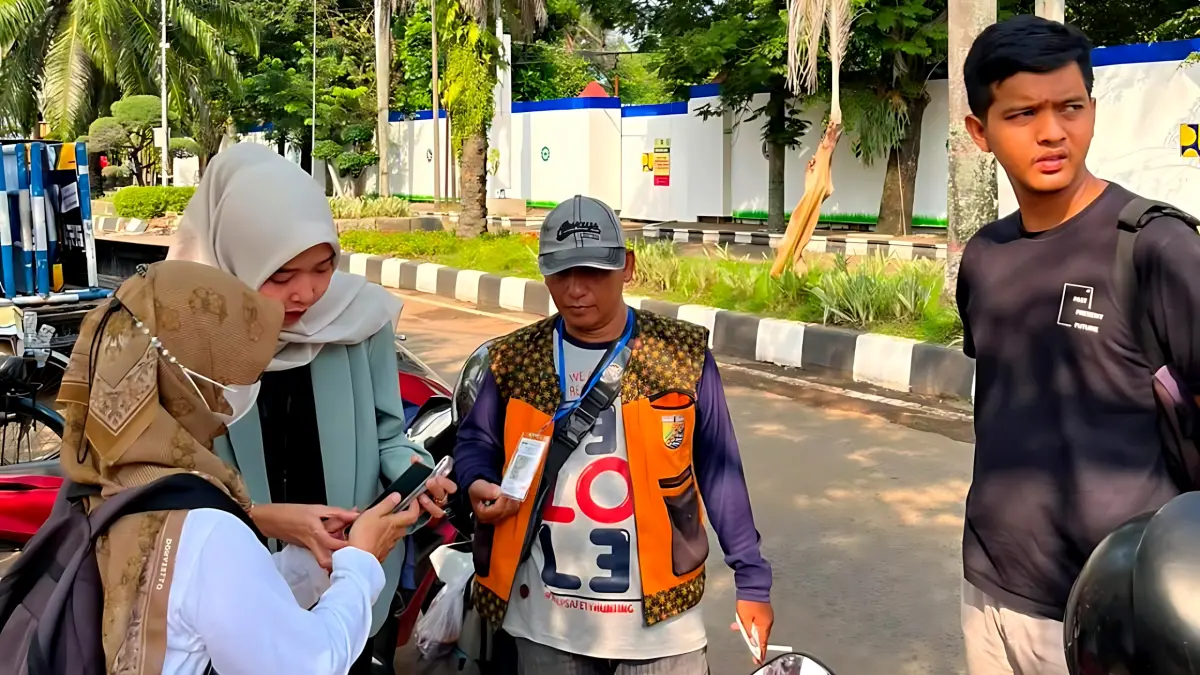 IST
BAYAR PARKIR - Warga Kota Pekalongan yang beraktifitas di Lapangan Mataram sudah mulai bayar parkir pakai QRIS, Jumat (29/5/2026).
