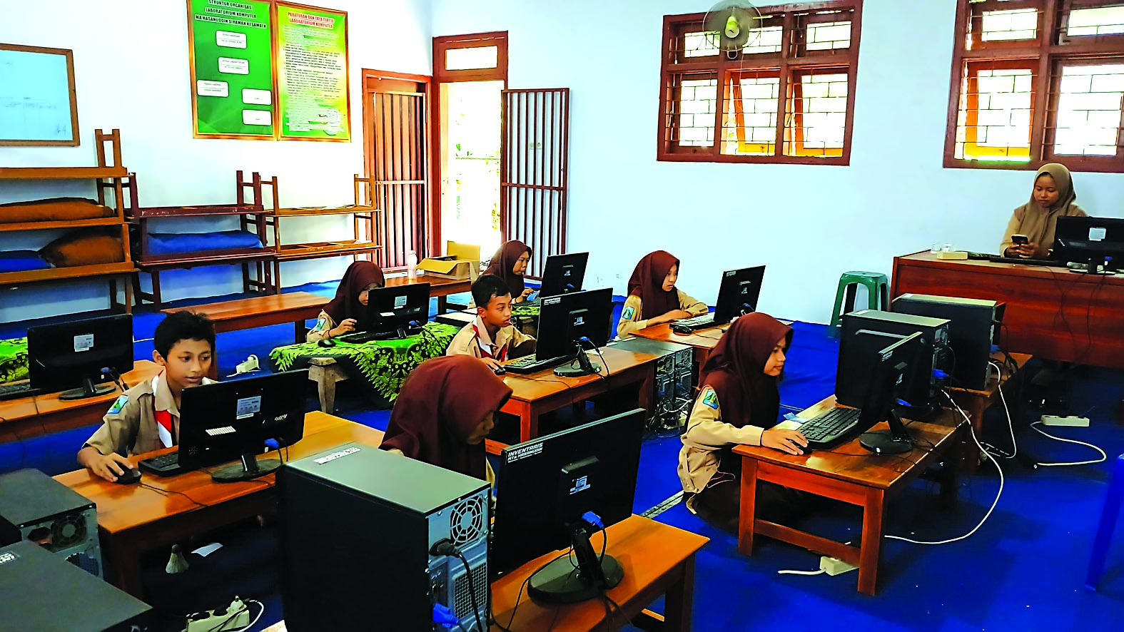 BERJALAN LANCAR: Babak penyisihan Radar Blitar Genza Olympiad, berlangsung di MTs Hasanuddin, pada Sabtu (7/12).