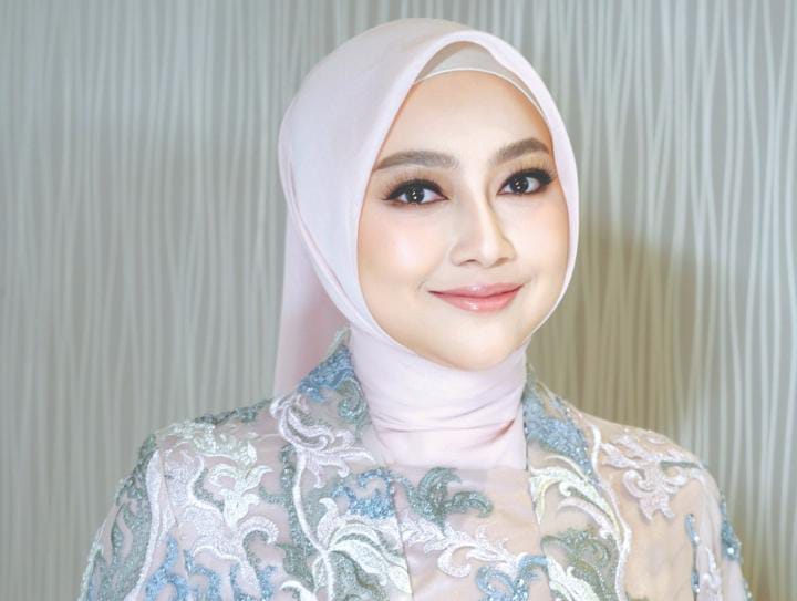 HARUS ADAPTASI: Hj Arina Andriani, istri Wakil Bupati Blitar, dalam sebuah kegiatan.