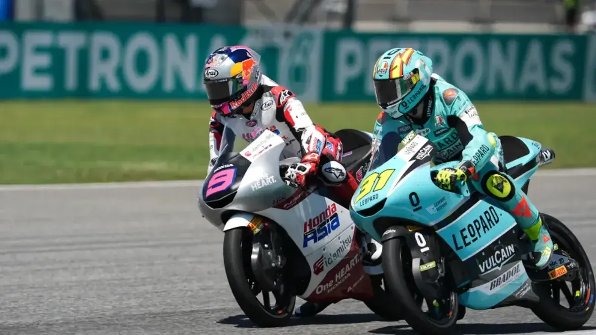 Analisis mendalam kemenangan Kiandra Ramadipa juara di Jerez dan dominasi Veda Ega Pratama di Moto3. Indonesia puncaki klasemen Rookie dunia!