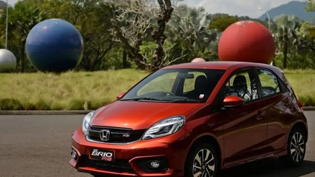 Honda Brio Satya 2026 versi termurah hadir di IMS 2026, harga Rp130 jutaan, fitur sederhana tapi tetap jadi LCGC favorit.(Gemini AI)