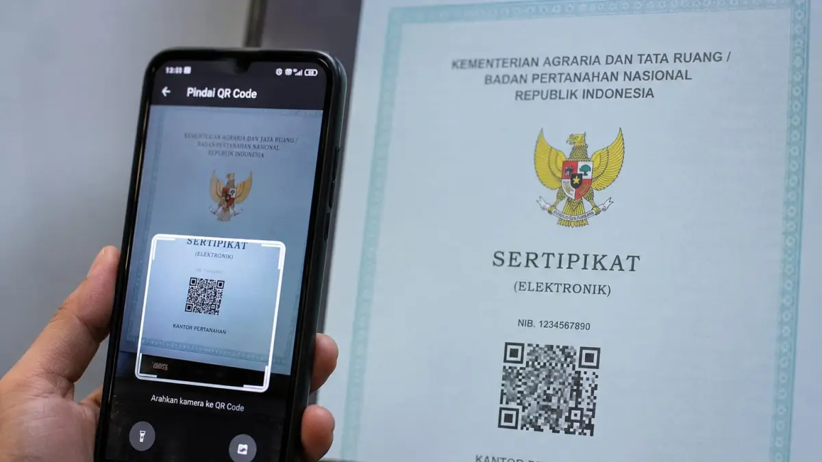 Ilustrasi QR Code pada sertifikat tanah elektronik yang terhubung dengan sistem Kementerian ATR/BPN untuk mengakses informasi bidang tanah.