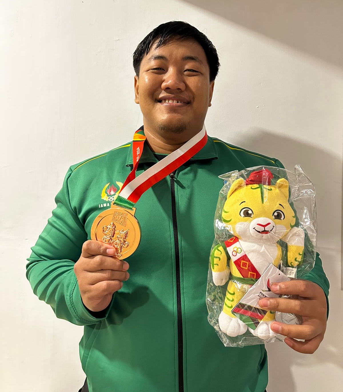 RAIH MEDALI PERUNGGU: Pegulat Lamongan, Dimas Septo Anugraha. (IST/RADAR LAMONGAN)