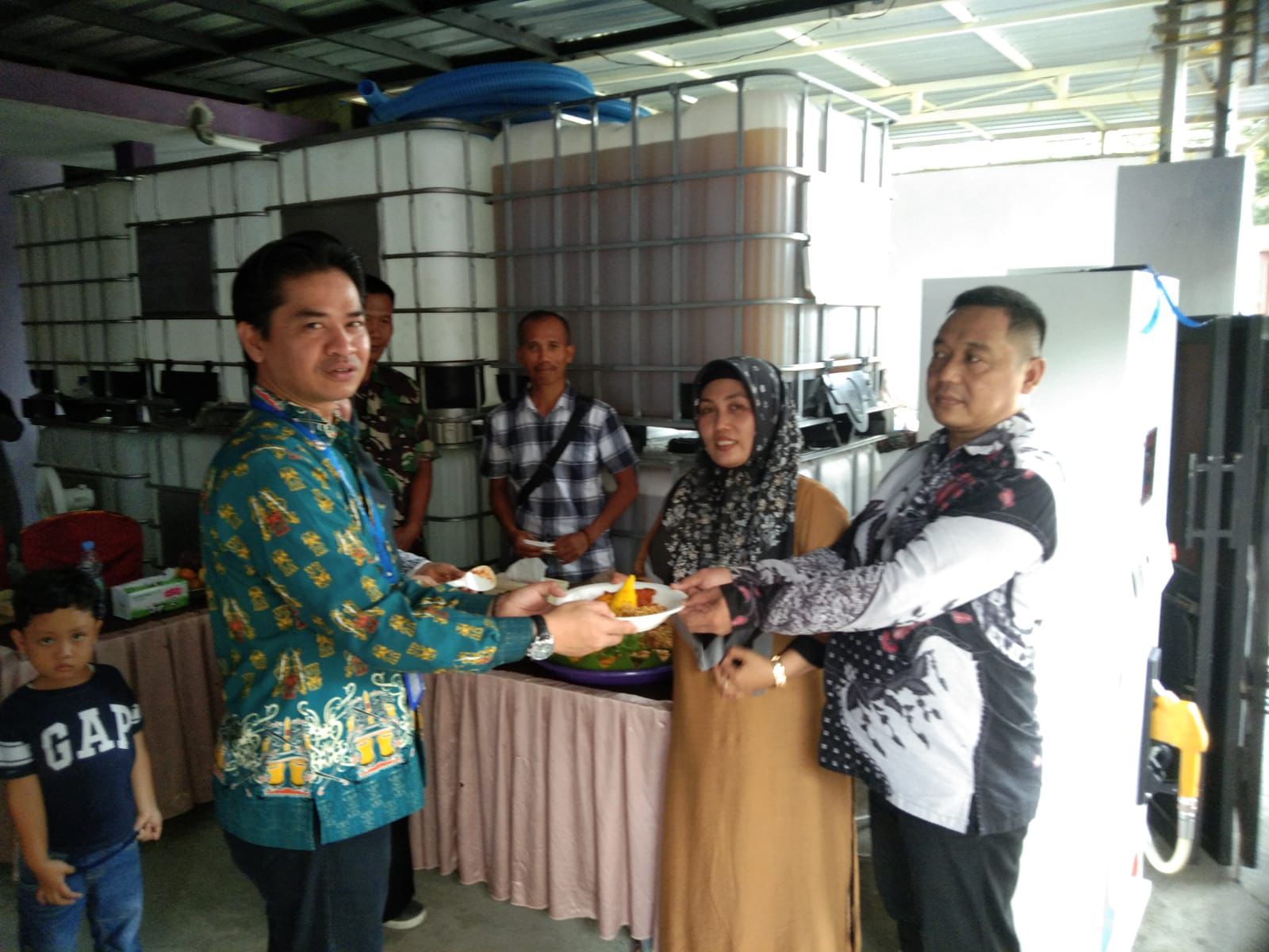 POTONG TUMPENG : Peresmian DEPO POMINDO di Kecamatan Kembangbahu diawali dengan pengguntingan pita dan potong tumpeng. (IST)