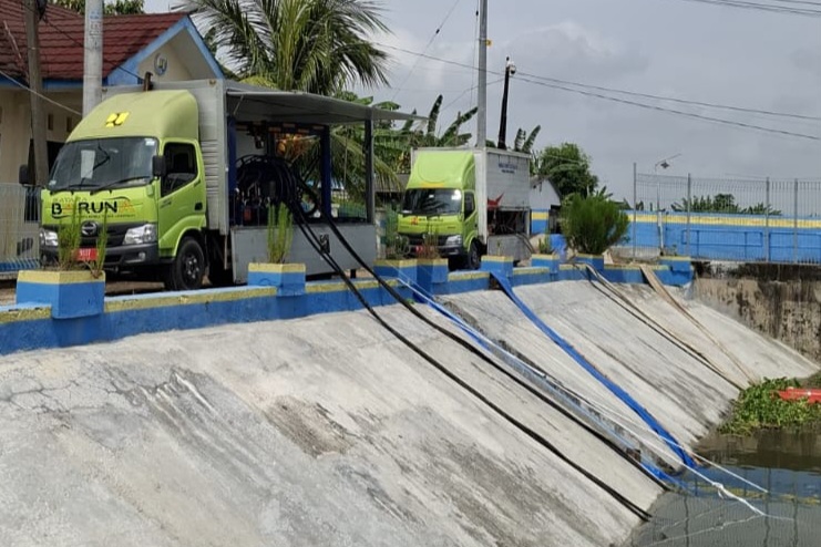 ATASI BANJIR: Sebanyak 14 pompa telah diaktifkan untuk mempercepat pembuangan di wilayah Bengawan Jero.