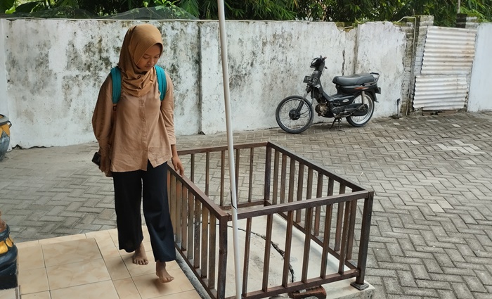 DIKELILINGI PAGAR: Sumur yang disakralkan oleh masyarakat setempat di Dusun/Desa Modopuro, Kecamatan Mojosari, Kabupaten Mojokerto. (foto: Nadya Azzahra for Radar Mojokerto).