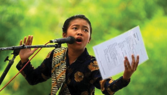 Ilustrasi Anak Sedang Membacakan Geguritan yang Sudah Tak Asing Lagi Bagi Warga Solo