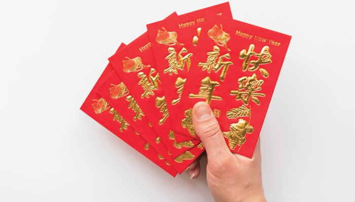 Ilustrasi Bagikan Angpau Saat Tahun Baru Imlek di Solo
