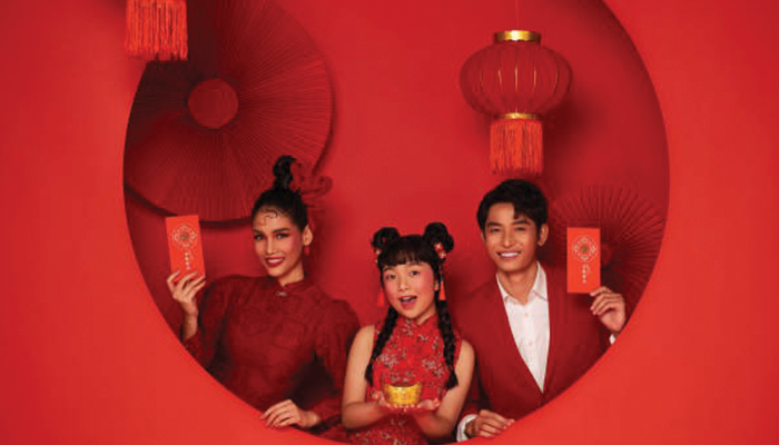 Ilustrasi keluarga yang merayakan imlek