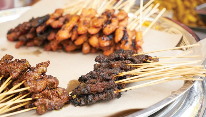 Ilustrasi sate menggunakan daging sapi saat Idul Adha.