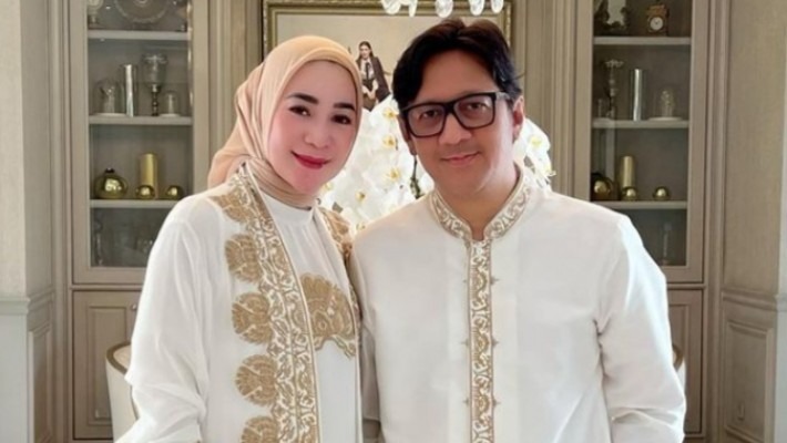 Andre Taulany dan Erin istrinya.