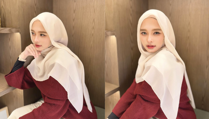 Inara Rusli menggunakan pakaian bernuansa nude pink.