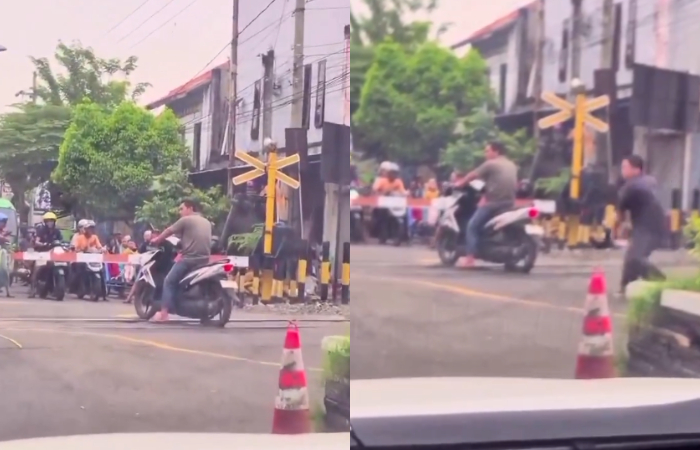Viral pria di Probolinggo nekat berhenti di tengah rel kereta.