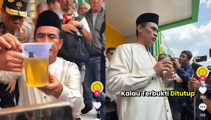 Menteri Pertanian Andi Amran Sulaiman menunjukkan Minyakkita yang tidak sesuai takaran saat sidak di Pasar Jaya Lenteng Agung, Jakarta Selatan (10/3)