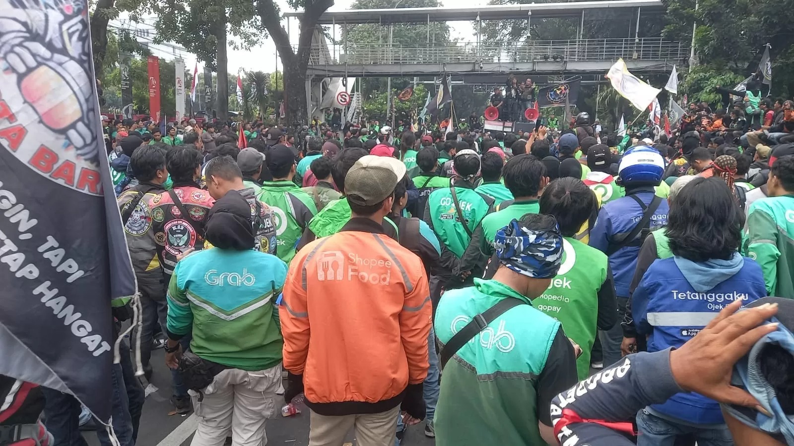 Ilustrasi demo ojek online di kawasan sekitar Istana Merdeka, Jakarta.