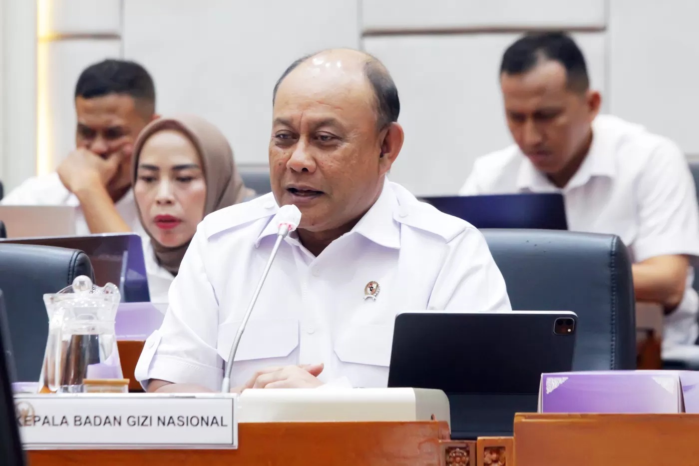 Kepala Badan Gizi Nasional (BGN) Dadan Hindayana mengikuti Rapat kerja dengan Komisi IX DPR di Kompleks Parlemen, Senayan, Jakarta, Selasa (6/5/2025).