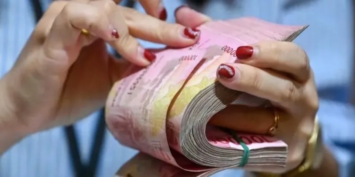 Ilustrasi uang rupiah - Bansos