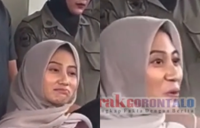 Ekspresi Dheninda Chaerunnisa yang tertangkap kamera saat orator demo sedang menyampaikan aspirasinya.