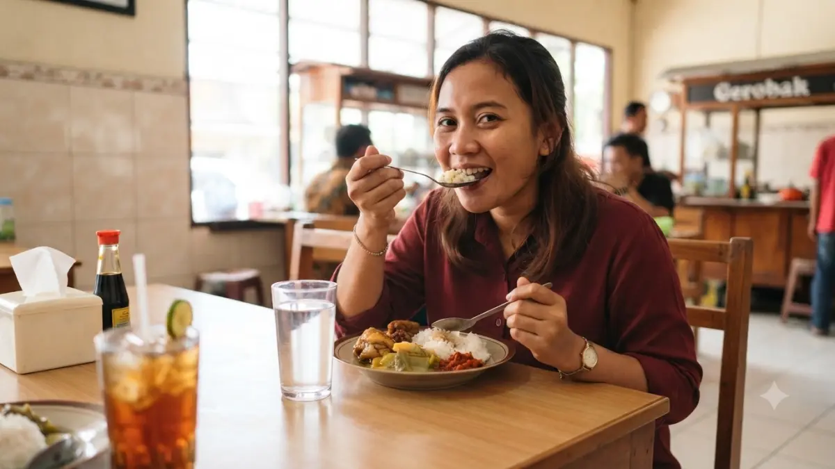Memilih air putih saat makan dapat menjadi salah satu cara sederhana untuk membantu mengurangi asupan gula harian. (AI Generated)