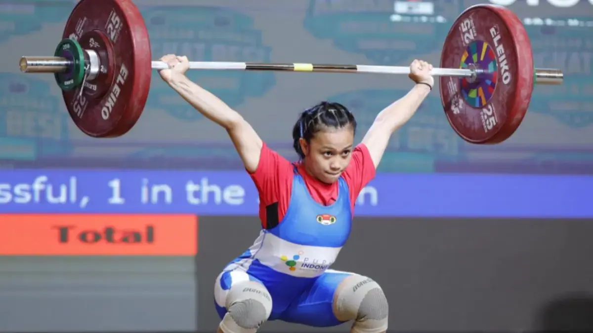 Luluk Diana Tri Wijayana sukses meraih medali perunggu pada debutnya di Asian Games 2026. Lifter asal Pacitan itu mencatat total angkatan 191 kilogram di kelas 49 kg putri.(Jawa pos)