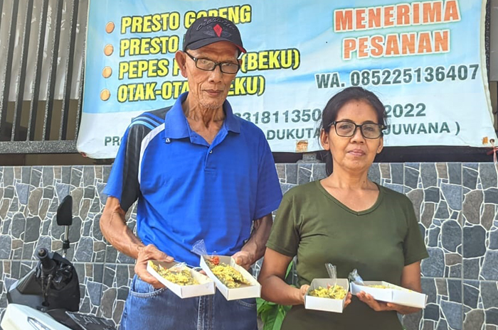 SERASI: Pasangan suami istri Darni dan Winarso setia memproduksi bandeng presto Juwana sudah 20 tahunan. Produk ikan bandeng presto pasangan suami istri Darni dan Winarso.