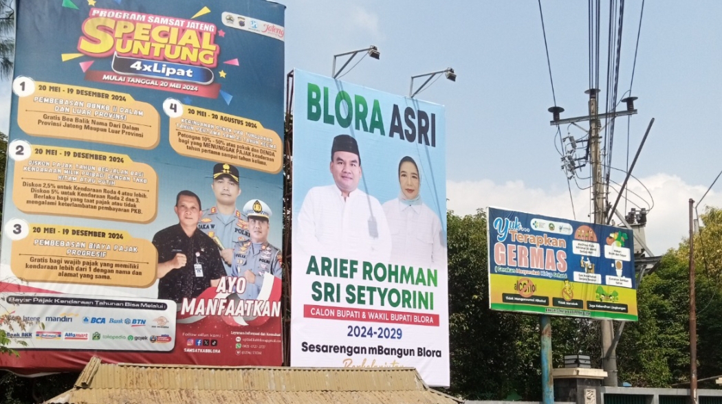BERTEBARAN: Baliho Arief Rohman berpasangan dengan Kakak Wakapolri Sri Setyorini mulai bermunculan.