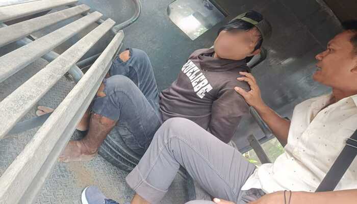 DIAMANKAN: Anggota Polsek Brati amankan tersangka pencurian di rumah milik A.A Gede Rai Serbada warga Desa Kronggen, Kecamatan Brati.