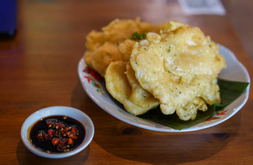 Ilustrasi foto Tempe goreng kemangi