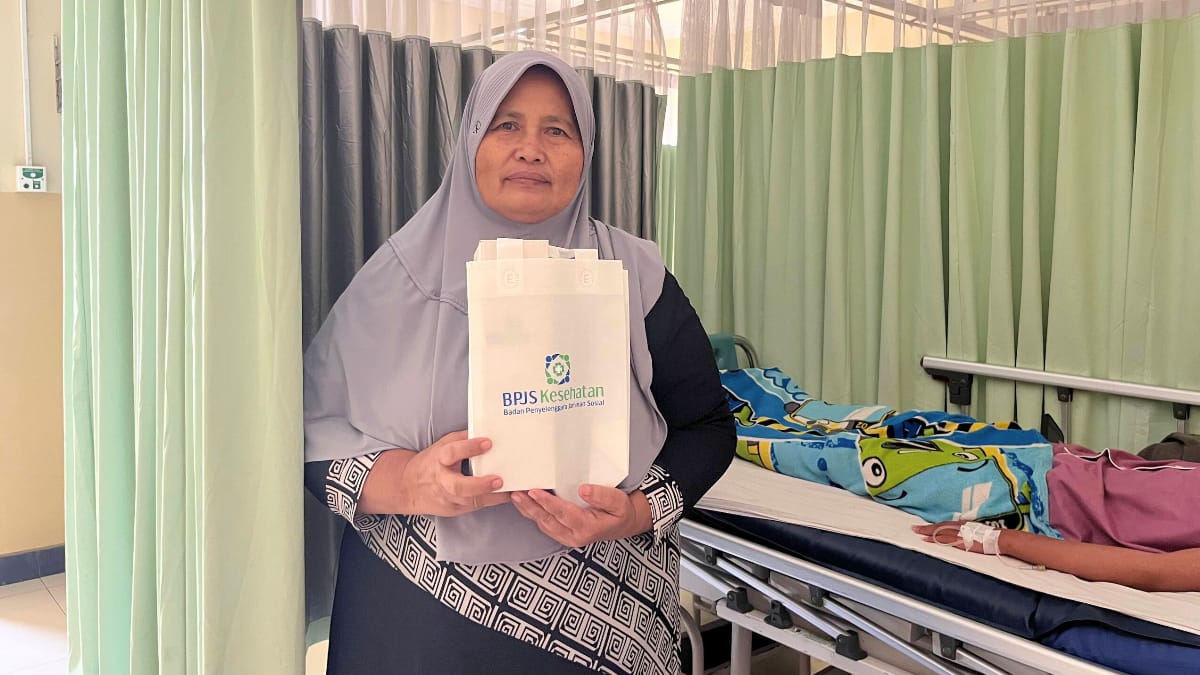 Ibu Kasmini, peserta Jaminan Kesehatan Nasional (JKN)