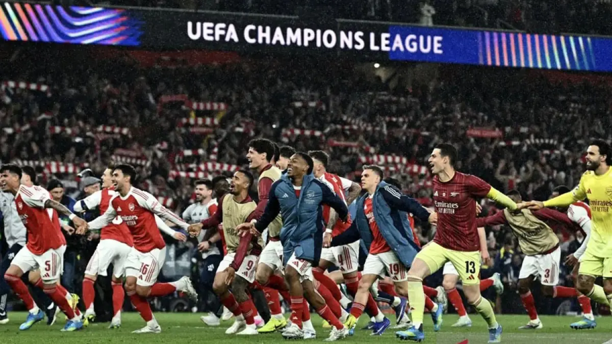 Pesepak bola Arsenal berselebrasi usai menang atas Atletico Madrid pada pertandingan leg kedua semifinal Liga Champions UEFA 2025/2026 di Emirates Stadium, London, Inggris, Selasa (5/5/2026). (REUTERS/Dylan Martinez/kye)