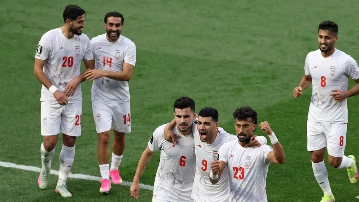 Selebrasi timnas Iran saat timnya berhasil menahan imbang Selandia Baru. 