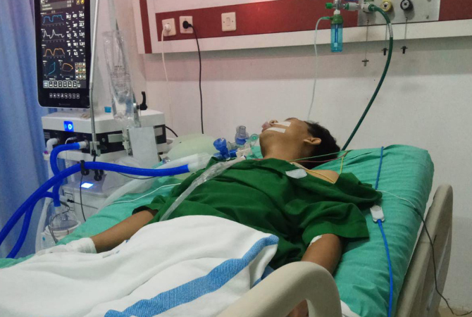 DIRAWAT: Kondisi Muhammad Taufik, 20, warga Desa/Kecamatan Pulokulon saat menjalani perawatan di Rumah Sakit Gondo Suwarno Ungaran, Kabupaten Semarang sebelum meninggal dunia. (ISTIMEWA)