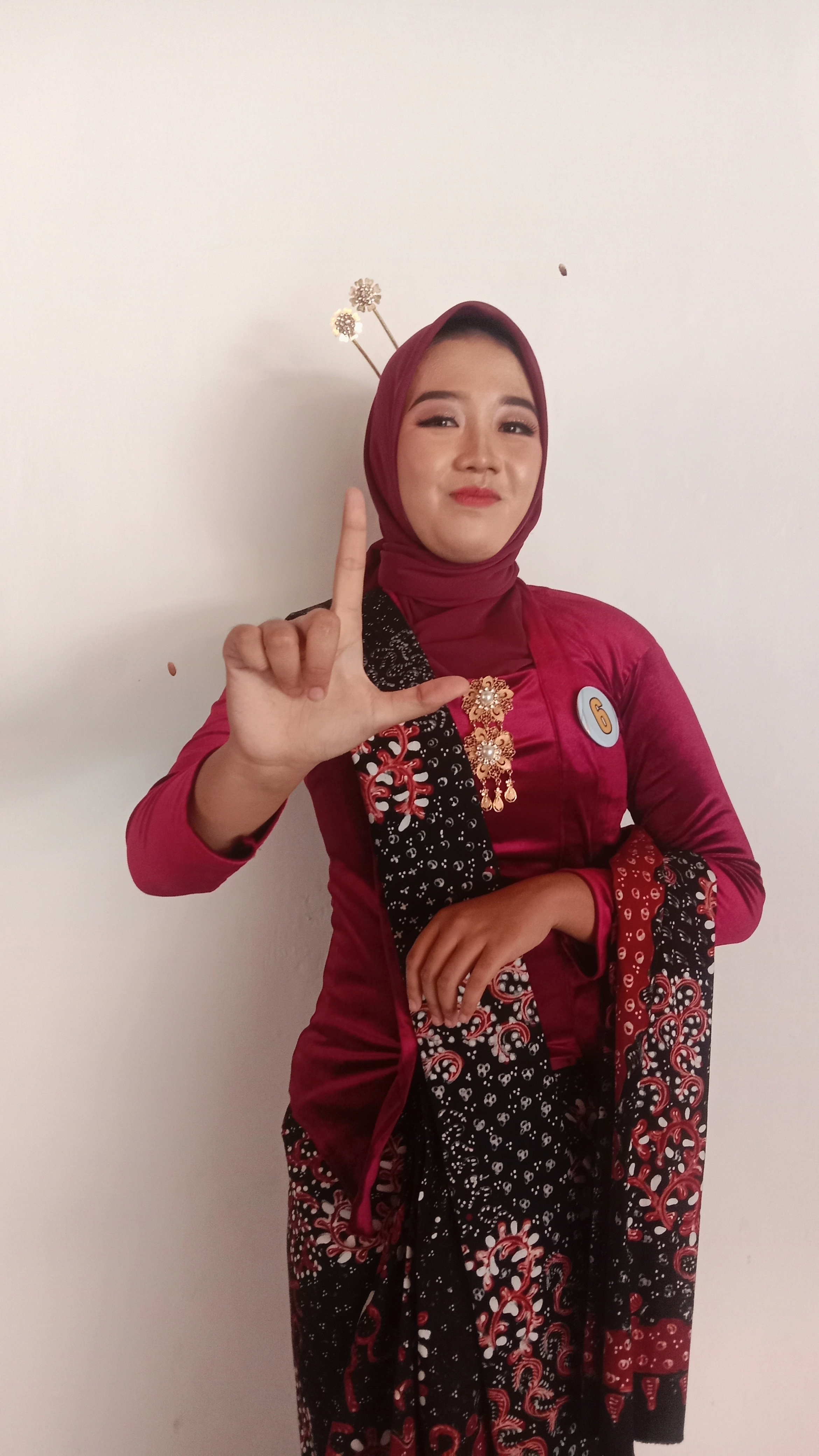 SENYUM: ANGGITA MAHARINI. (VACHRI RINALDY L/RADAR KUDUS)
