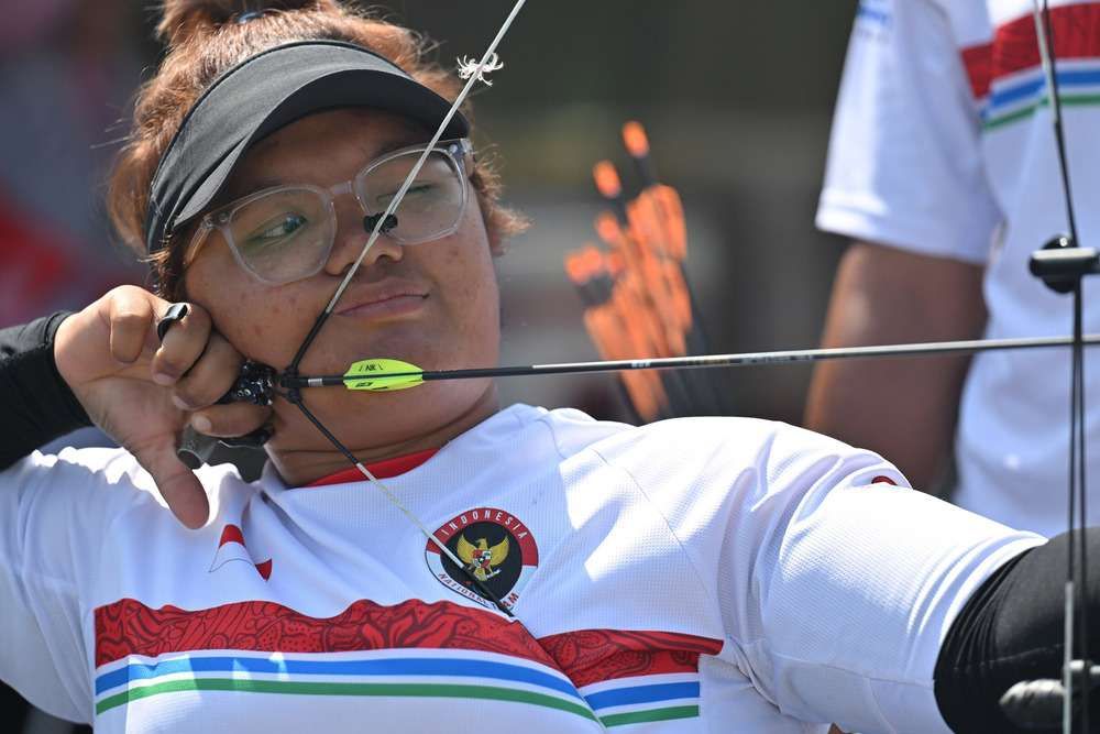 BERPELUANG MEDALI: Atlet Para Panahan Teodora Audi berlaga pada Paralimpiade Paris 2024. Ia lolos per deapan besar dan berpeluang meraih medali. (Dok. NPC Indonesia)