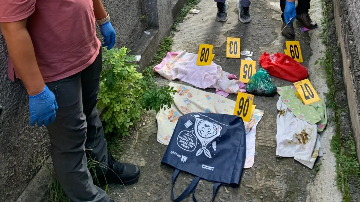 DIBUANG: Olah TKP penemuan bayi laki-laki di Desa Growong Kidul, Kecamatan Juwana. (HUMAS POLRESTA)
